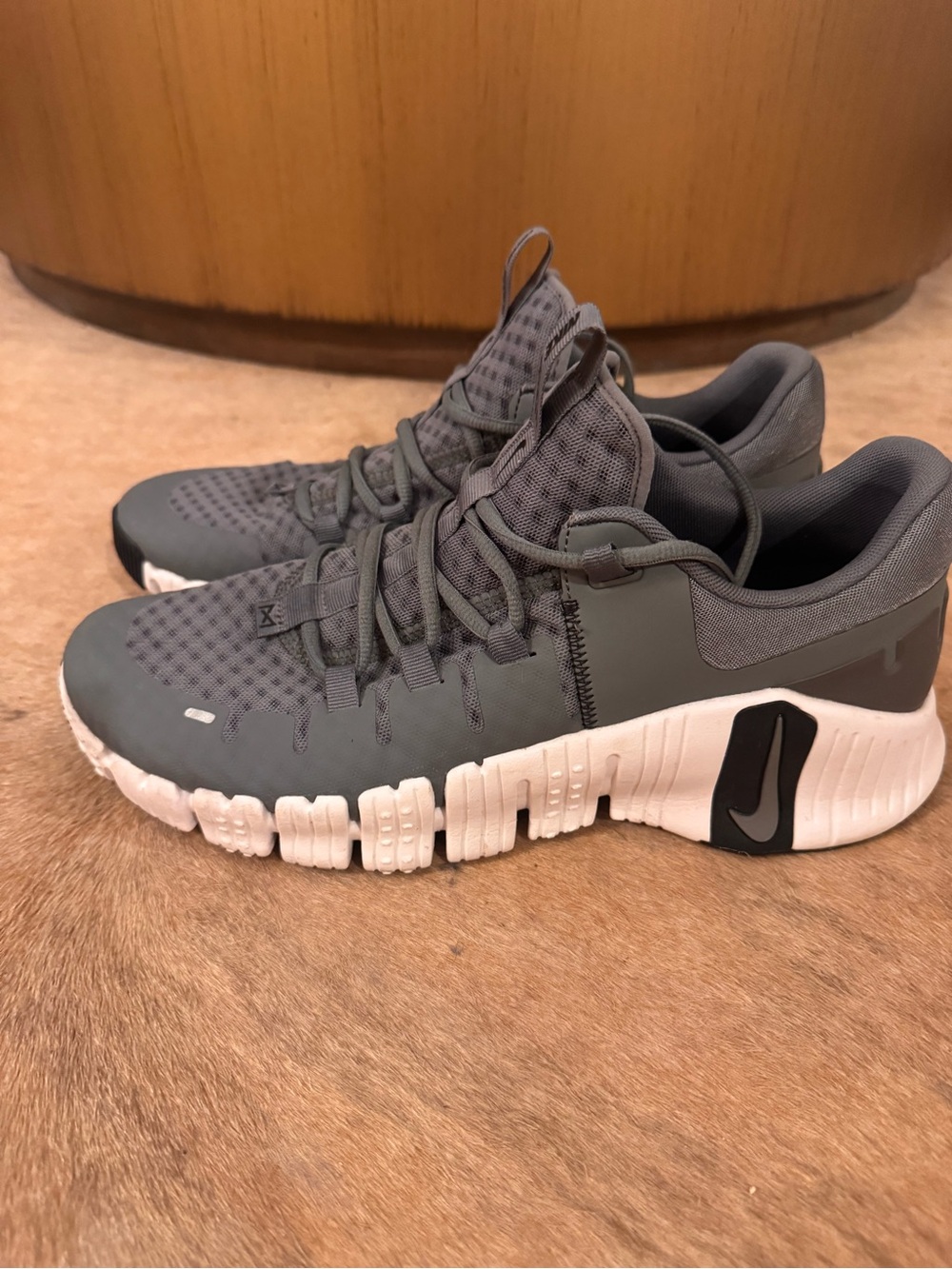 Nike Gray and White Athletic Sneakers with Black Swoosh